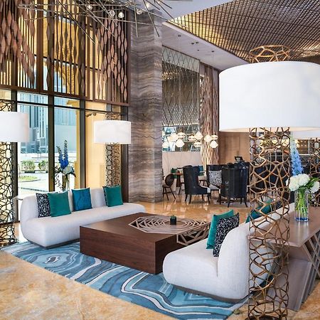 דובאי Al Jaddaf Rotana Suite Hotel מראה חיצוני תמונה Lobby