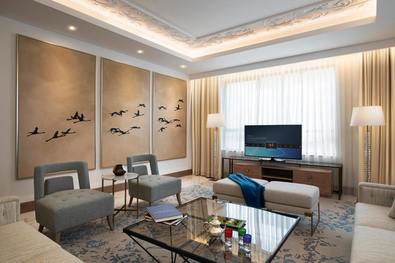 דובאי Al Jaddaf Rotana Suite Hotel מראה חיצוני תמונה A living room