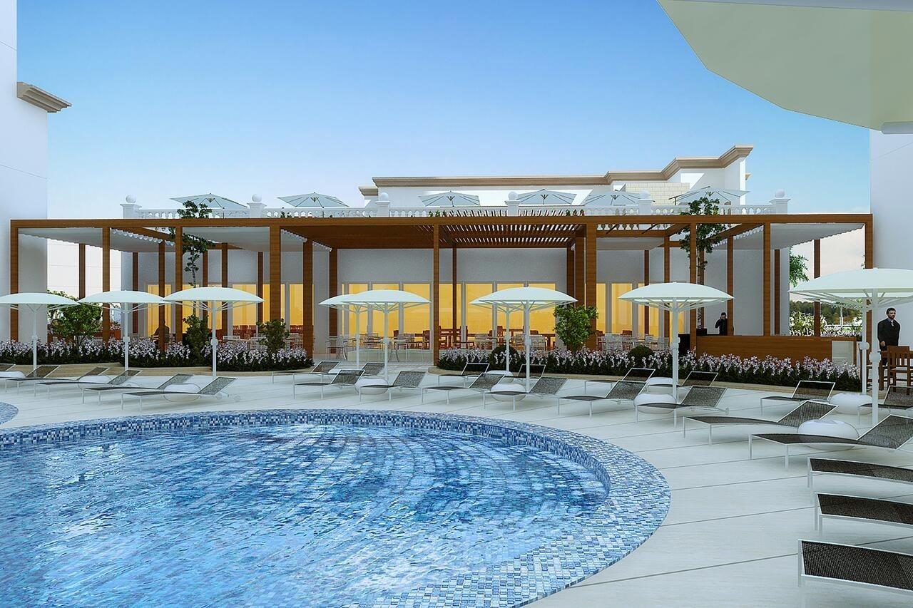 דובאי Al Jaddaf Rotana Suite Hotel מראה חיצוני תמונה The pool at the hotel