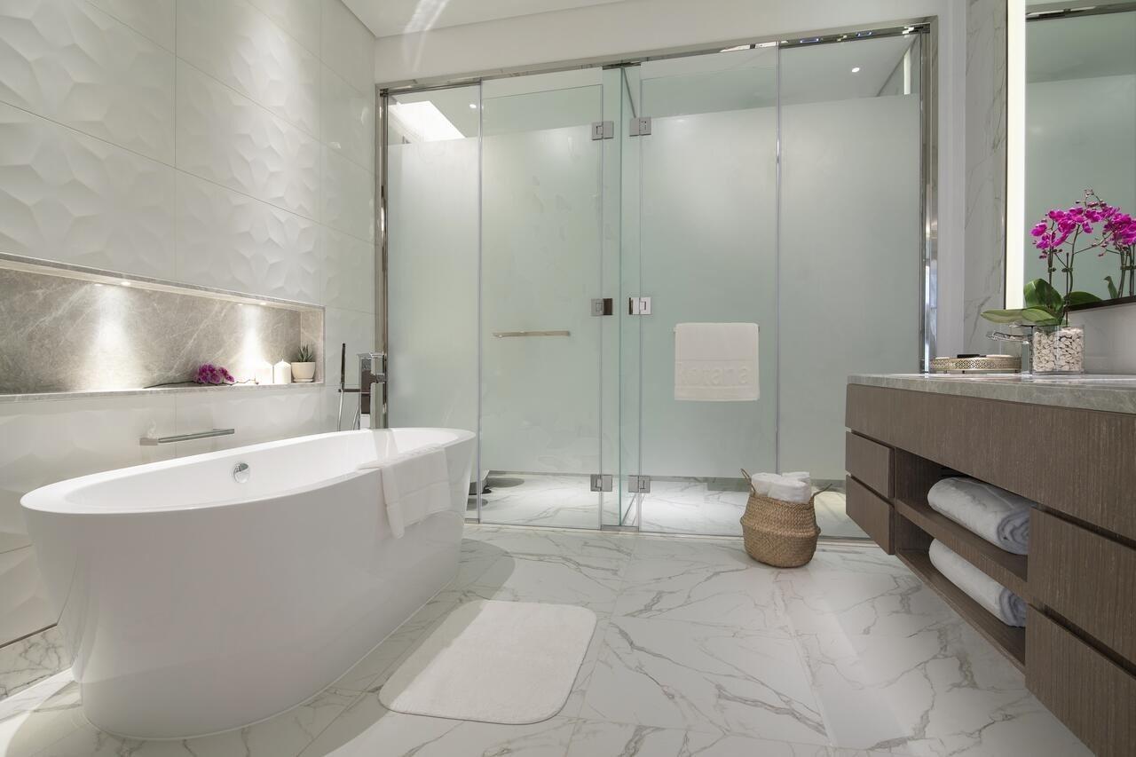 דובאי Al Jaddaf Rotana Suite Hotel מראה חיצוני תמונה A modern bathroom
