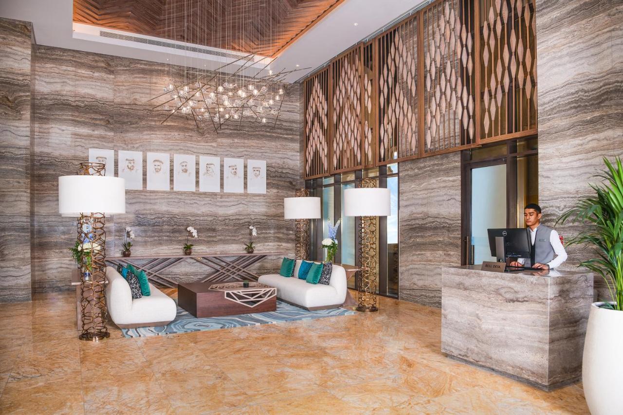 דובאי Al Jaddaf Rotana Suite Hotel מראה חיצוני תמונה Lobby