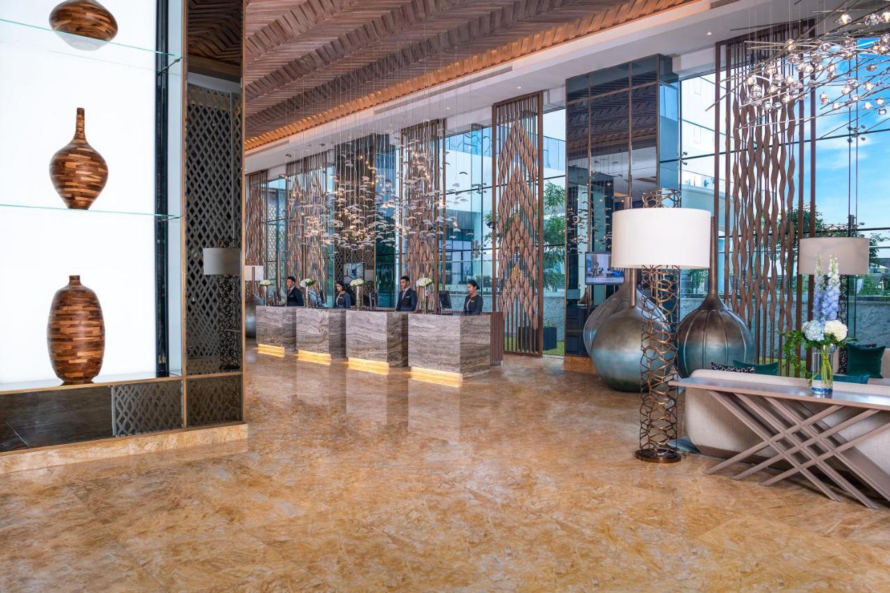 דובאי Al Jaddaf Rotana Suite Hotel מראה חיצוני תמונה Lobby